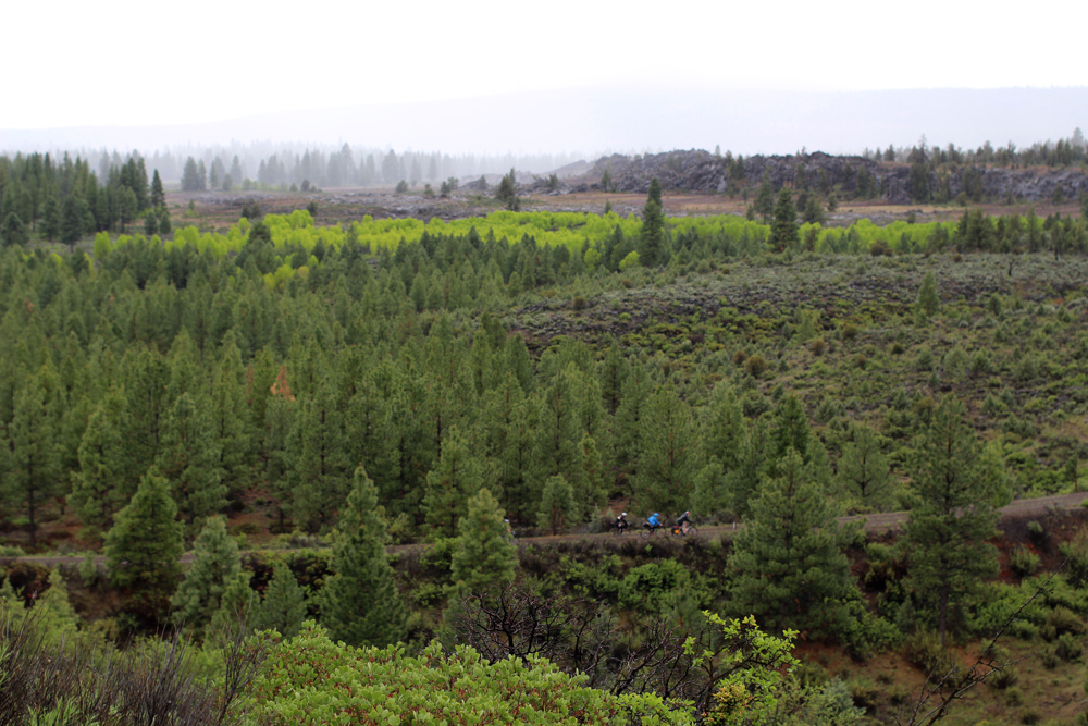  Riders below on the OE&amp;E double switchback between K Falls and Sprague River. A minute after this photo was taken the approaching curtain of rain enveloped us for the next hour or so. 