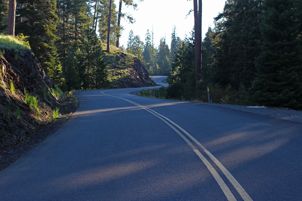  Dawn the next morning saw us break camp with 6 more miles to climb to the summit of the Ochocos. Temps were in the high 30's and my knees let me know it. The morning light in the mountains was enough to take my mind off the pain, and the McKay creek road climb is fairly gentle. 